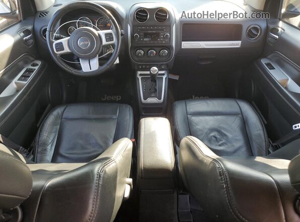 1C4NJCEA8GD751887 2016 JEEP COMPASS Black Widok deski rozdzielczej