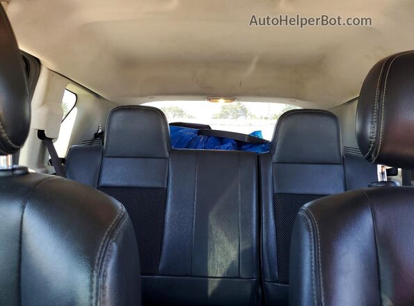 1C4NJCEAXGD665982 2016 JEEP COMPASS Black Rear seats view