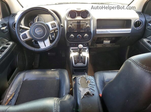 1C4NJCEAXGD665982 2016 JEEP COMPASS Black Dashboard view