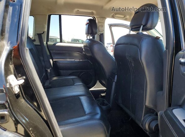 1C4NJCEAXGD665982 2016 JEEP COMPASS Black Rear interior view