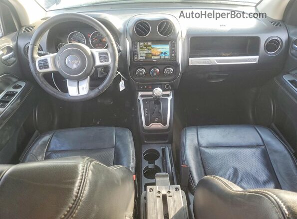 1C4NJDAB2GD626307 2016 JEEP COMPASS Черный Вид панели приборов