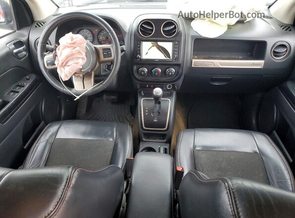 1C4NJDBB0GD690344 2016 JEEP COMPASS Черный Вид панели приборов