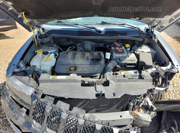 1C4NJDBB1GD733881 2016 JEEP COMPASS Silver Սալոնի հետևի տեսք