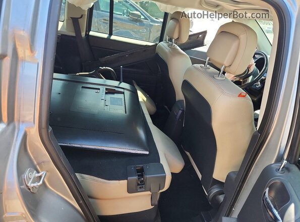 1C4NJDBB1GD733881 2016 JEEP COMPASS Silver Հետևի նստատեղերի տեսք