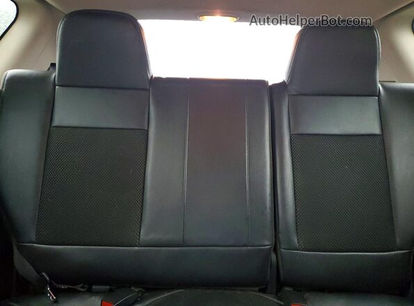 1C4NJDBB2GD598720 2016 JEEP COMPASS Silver Widok tylnych siedzeń