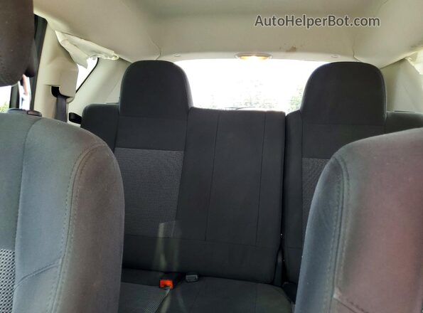 1C4NJDBB3GD635922 2016 JEEP COMPASS Gray Widok tylnych siedzeń