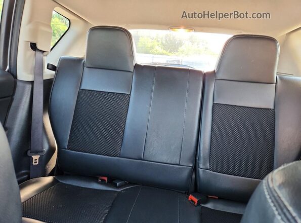 1C4NJDBB3GD657774 2016 JEEP COMPASS Silver Rear seats view