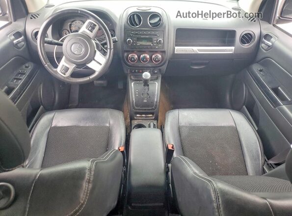 1C4NJDBB9GD598519 2016 JEEP COMPASS Black Vista del salpicadero