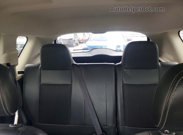 1C4NJDBB9GD598519 2016 JEEP COMPASS Black Vista de los asientos traseros