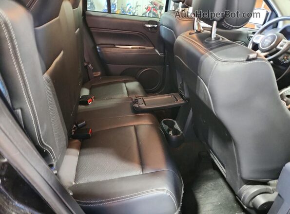 1C4NJDEB2GD696349 2016 JEEP COMPASS Black Vista interior trasera