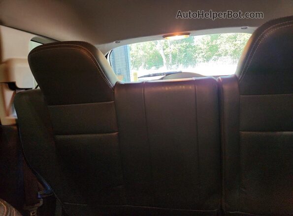 1C4NJDEB2GD696349 2016 JEEP COMPASS Black Vista de los asientos traseros