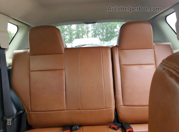 1C4NJDEB3GD696327 2016 JEEP COMPASS Black Vista de los asientos traseros