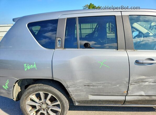 1C4NJDEB6GD639779 2016 JEEP COMPASS Silver Vista de los asientos traseros