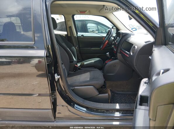 1C4NJPBA4GD811711 2016 JEEP PATRIOT Black Front interior view