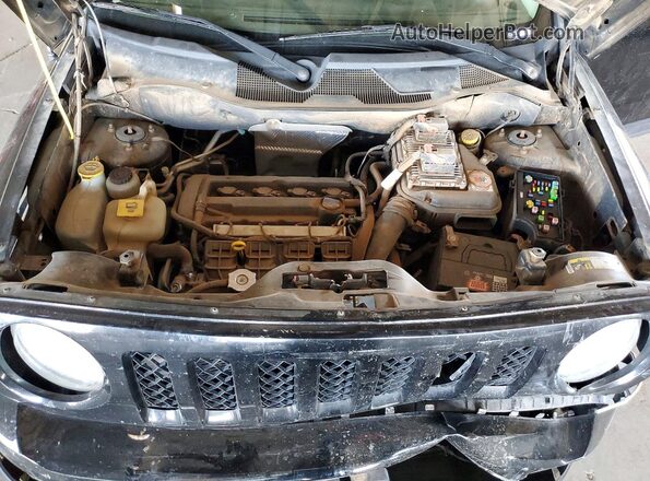 1C4NJPFA1GD554629 2016 JEEP PATRIOT Черный Вид задней части салона