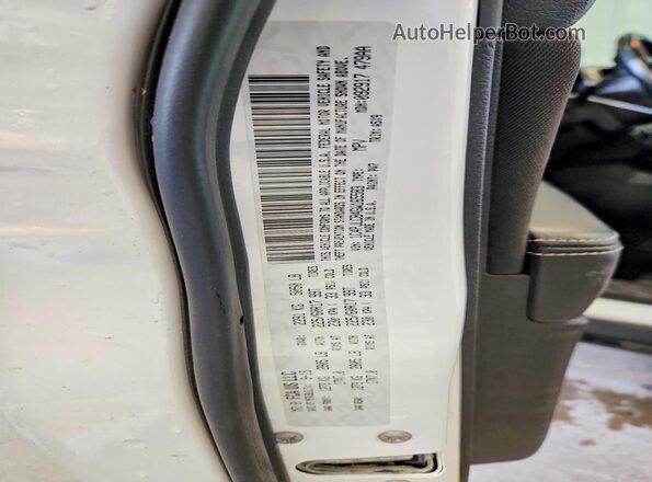 1C4PJLCB4GW165583 2016 JEEP CHEROKEE White VIN sticker view