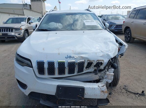 1C4PJLCB4MD113331 2021 JEEP CHEROKEE White Vista interior trasera