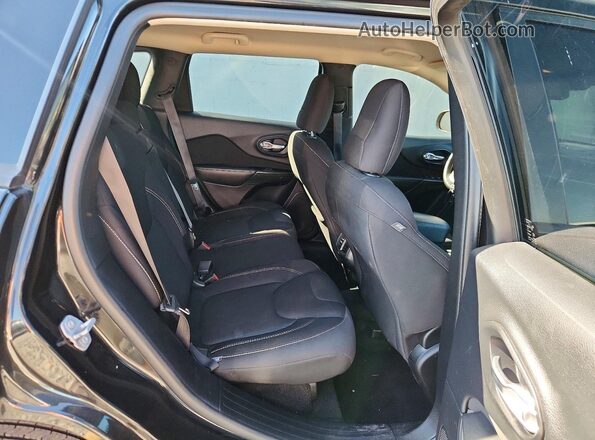 1C4PJLCB8GW146390 2016 JEEP CHEROKEE Black Rear interior view