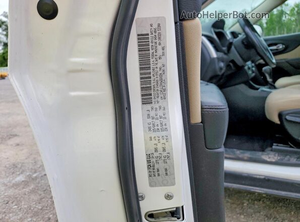 1C4PJLCSXHW560224 2017 JEEP CHEROKEE White VIN sticker view