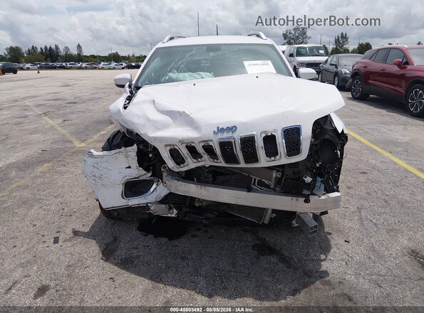 1C4PJLDB5LD560652 2020 JEEP CHEROKEE White Vista interior trasera