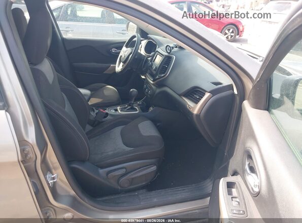1C4PJMAB2HW656860 2017 JEEP CHEROKEE Brown Вид салону спереду
