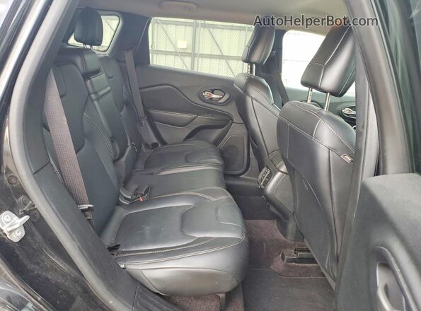 1C4PJMDB7GW262247 2016 JEEP CHEROKEE Charcoal Rear interior view