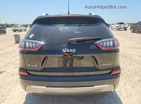 1C4PJMDN2KD180716 2019 JEEP CHEROKEE Black Սալոնի հետևի տեսք