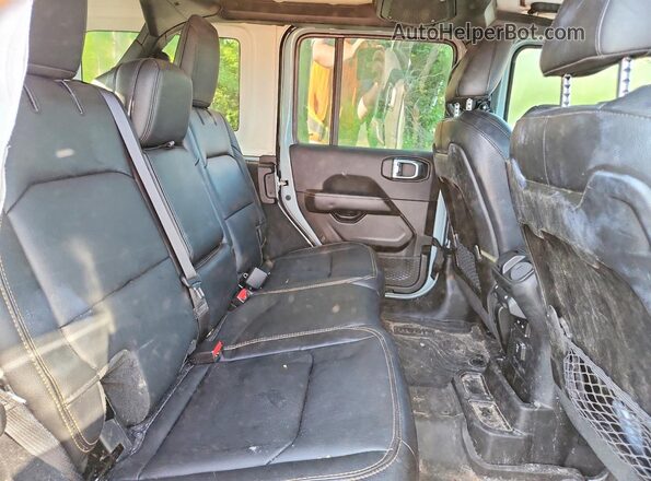1C4PJXENXRW170773 2024 JEEP WRANGLER Blue Vista interior trasera