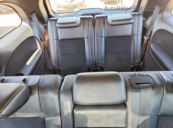 1C4RDJDG3JC282191 2018 DODGE DURANGO Silver Rear seats view