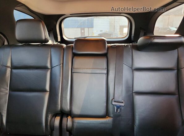 1C4RDJDG4GC449232 2016 DODGE DURANGO Silver Rear seats view