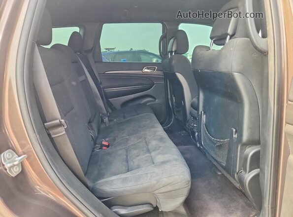 1C4RJFAG1HC773394 2017 JEEP GRAND Brown Widok wnętrza z tyłu