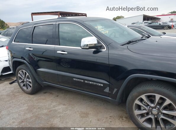 1C4RJFBG9JC138072 2018 JEEP GRAND CHEROKEE Black Rear interior view