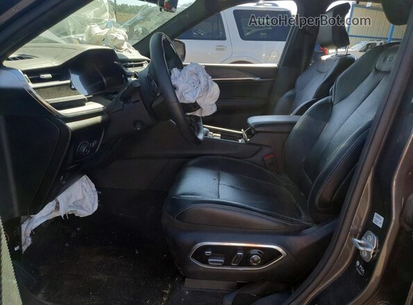 1C4RJHDG7P8860385 2023 JEEP GRAND Charcoal Front interior view