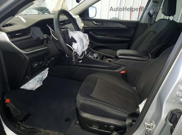1C4RJKAG8P8823735 2023 JEEP GRAND Серебряный Вид салона спереди