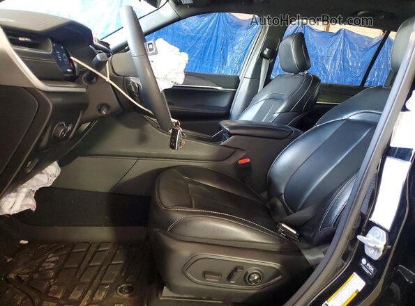 1C4RJKBG2R8602567 2024 JEEP GRAND Black Widok wnętrza z przodu
