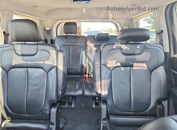 1C4RJKBGXP8710951 2023 JEEP GRAND Black Widok tylnych siedzeń