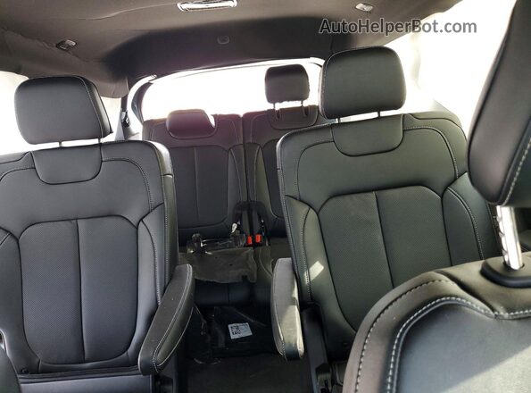 1C4RJKBR7T8554203 2026 JEEP GRAND Teal Rear seats view