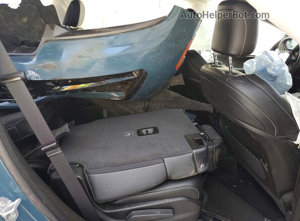 1C4RJKBR7T8554203 2026 JEEP GRAND Teal Rear interior view