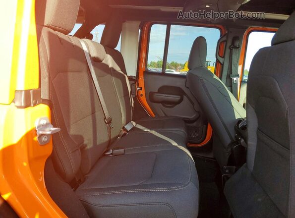 1C4RJXDG0SW632260 2025 JEEP WRANGLER Orange Widok wnętrza z tyłu