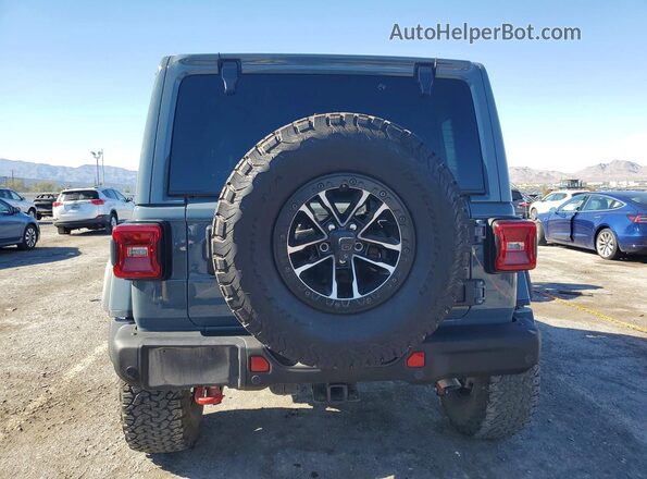 1C4RJXFG0RW129173 2024 JEEP WRANGLER Серый Вид сзади