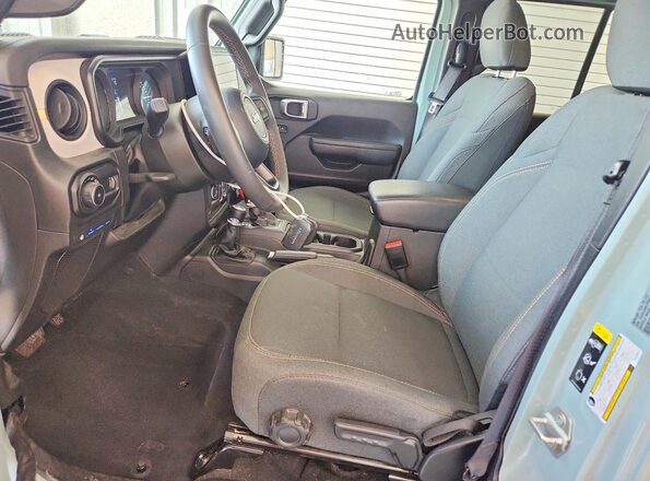 1C4RJXN61RW189679 2024 JEEP WRANGLER Зеленый Вид салона спереди