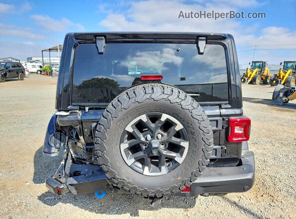 1C4RJXR64RW212754 2024 JEEP WRANGLER Black Vista trasera