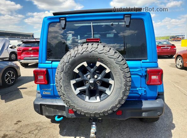 1C4RJXR66RW184293 2024 JEEP WRANGLER Blue Vista trasera