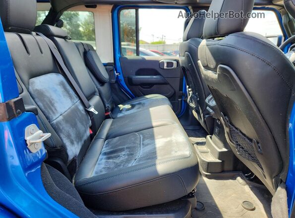 1C4RJXR66RW184293 2024 JEEP WRANGLER Blue Vista interior trasera