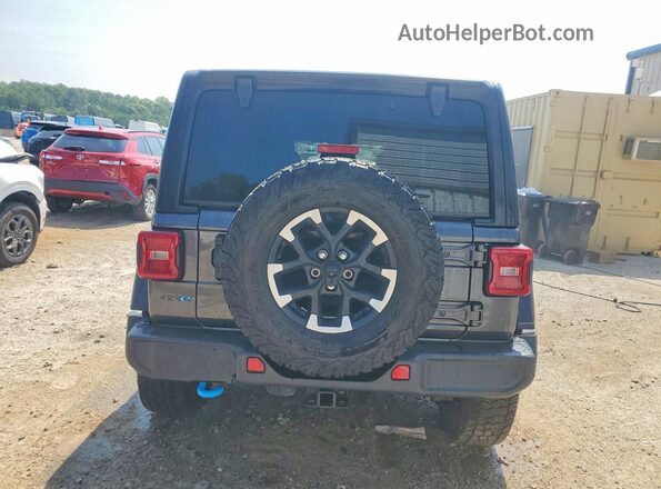 1C4RJXR66RW242046 2024 JEEP WRANGLER Gray Вид ззаду