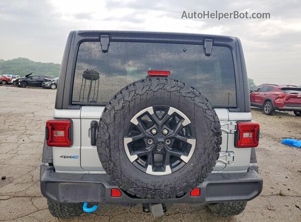 1C4RJXR68RW276716 2024 JEEP WRANGLER Silver Вид ззаду