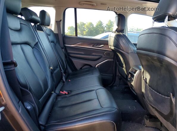 1C4RJYB61PC665728 2023 JEEP GRAND Black Rear interior view