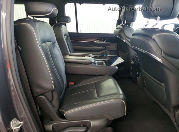 1C4SJSFPXPS578157 2023 JEEP GRAND Charcoal Widok wnętrza z tyłu
