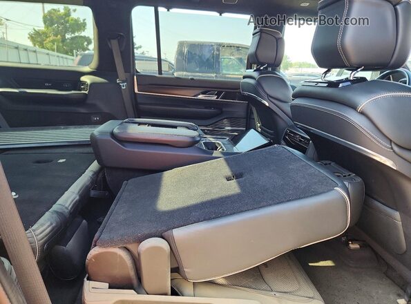 1C4SJSFPXRS139138 2024 JEEP GRAND Black Սալոնի հետևի տեսք