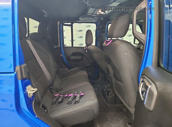 1C6JJTAG4PL577225 2023 JEEP GLADIATOR Blue Widok wnętrza z tyłu